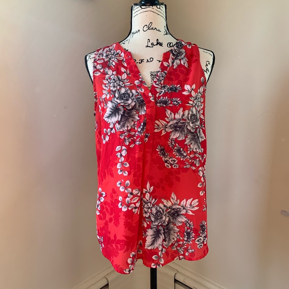 Pink and flowery sleeveless top